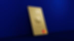 Mastercard gull mot mørk blå bakgrunn